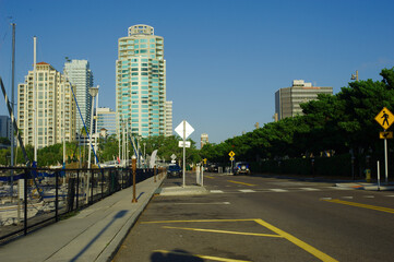 City Scape with Marina in foreground. Water reflections on a sunny morning.