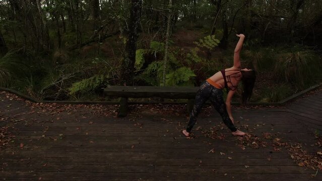 Lock shot of a person doing hatha yoga exercises