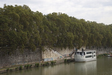 Fototapeta na wymiar Boats on the Tiber river, Rome