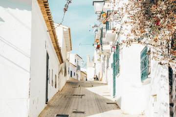 Altea old town with narrow streets and whitewashed houses. Architecture in small picturesque...
