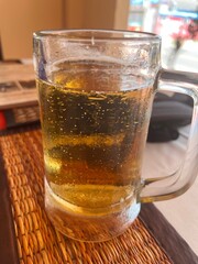 A Glass of chiller beer being served at a restaurant in the Krabi Province of Thailand