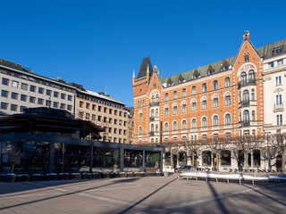 Naklejka premium Old town of Stockholm on a sunny winter day, facades of old Scandinavian stone houses.
