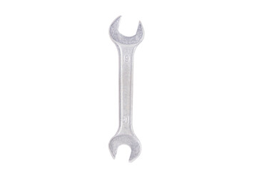 Closeup of stainless steel double head wrench background cutout. Repair and maintenance tool in engineering workshop concept.