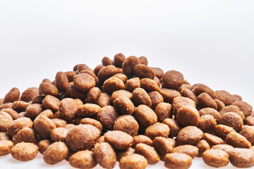  Delicious group of dog food balls over isolated white background