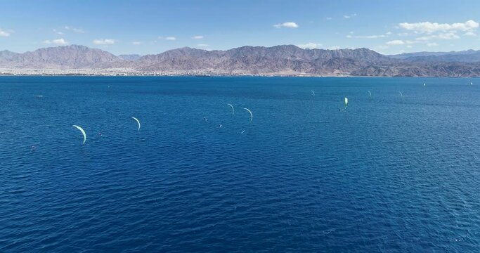 Aerial footage of professional kite surfers in front of the amazing beaches of Eilat. Filmed in C4K Apple ProRes 422 HQ