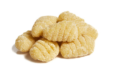 Raw uncooked potato gnocchi isolated on a white backgound. Close up. Home cooking.Tasty italian food. 