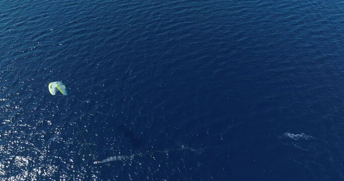Aerial footage of professional kite surfers in front of the amazing beaches of Eilat.