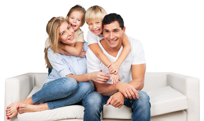 Beautiful smiling family sitting at sofa at home - Powered by Adobe