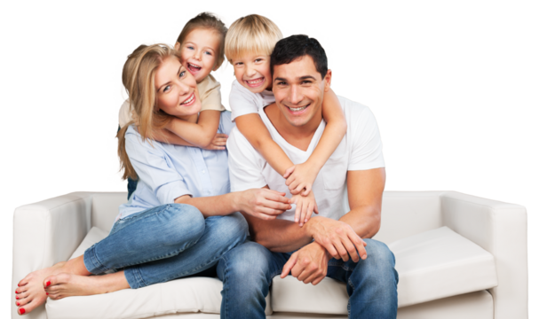 Beautiful smiling family sitting at sofa at home