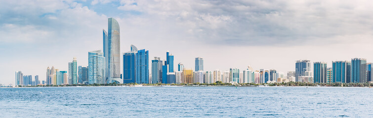 The panoramic view of Abu Dhabi's skyscrapers is a testament to the city's ambitious and forward-thinking development, with towering structures that dominate the skyline and capture the imagination.