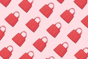 Cute polka dot handbags, summer fashion trends idea, retro romantic style, creative pattern, pastel pink background. © Biancaneve MoSt