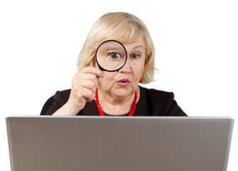 Shocked Old Woman Looking Through Loupe and Using Laptop - Isolated
