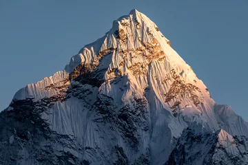 Washable wall murals Ama Dablam Sunset on Ama Dablam (6812m): tip of Ama Dablam being gently touched by last rays of sun. See ya tomorrow... Photo taken from the village of Dzonghla
