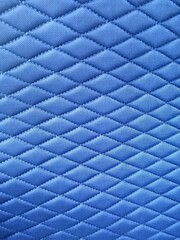 The texture is blue velor, soft fabric.