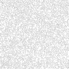 Abstract monochrome background of black dashes like dashes and dust particles on white. fine sandy dust covering a grunge wall or cracked surface from heat