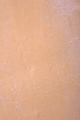 Fototapeta premium Sheets of raw puff pastry on a dark concrete background