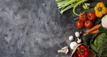 various vegetables over grey stone background