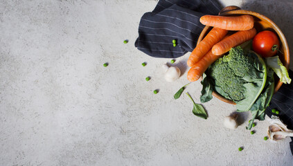 various vegetables over grey stone background