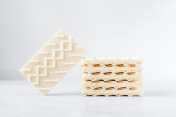 Vanilla wafers on a marble plate, wafer cookies filled with vanilla cream