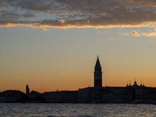 Fototapeta na wymiar San Marco skyline silhouette at sunset, Venice