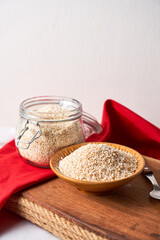 Amaranth seeds and energy bars on wood - Amaranthus