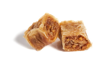 Turkish sweet pastry baklava with walnuts isolated on white background. 