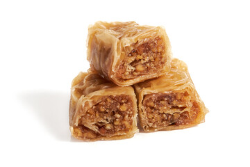 Turkish sweet pastry baklava with walnuts isolated on white background. 