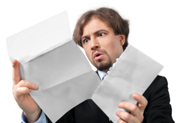 Portrait of a Scared Businessman Looking at Some Documents