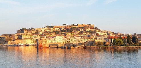View of the city of Portoferraio at sunrise. Panorama.