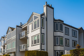 Modern and new apartment building. Multistoried modern, new living block of flats. Real estate condo architecture