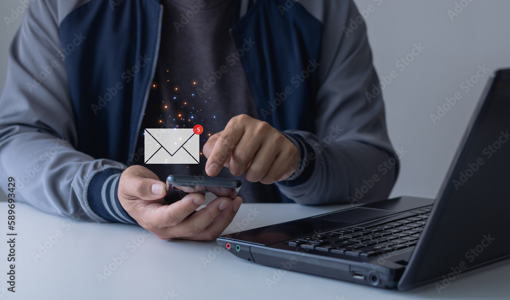 Poster email marketing concept. hand of businessman using smartphone for email with notification alert, rec