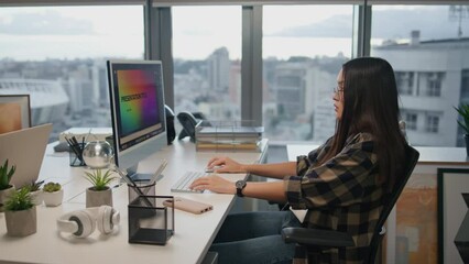 Pensive woman creating presentation at office closeup. Startuper using computer