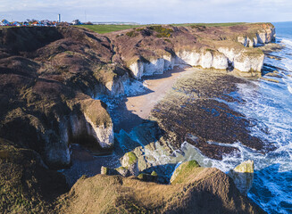 Flamborough Head. Drone aerial view of sunny white chalk cliff. Coastline as favourite UK travel destination. High quality photo