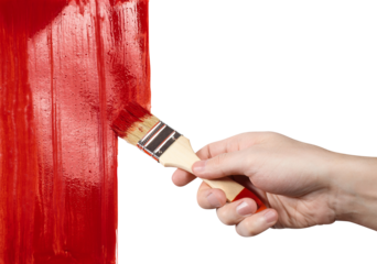 Hand draws with red paint using a thick brush, cut out