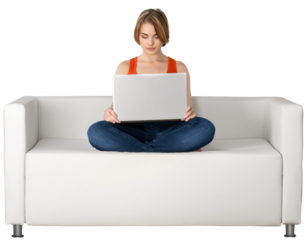 Portrait of a Woman Using her Laptop on a Couch