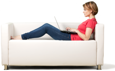 Portrait of a Woman Using her Laptop on a Couch