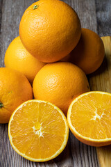 Close-up of stacked and cut oranges