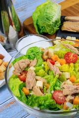 Close-up of an Salad in a glass bool with its ingredients around 