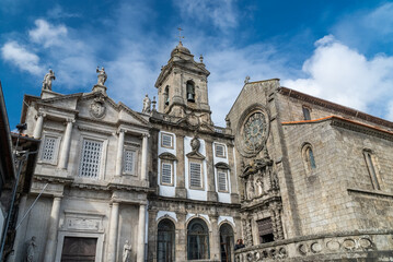 Oporto, Portugal. April 12 , 2022: Architecture and facade of San Francisco church with blue sky.