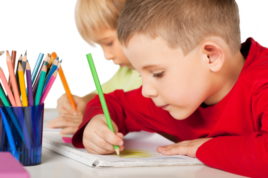 Boys drawing with pencils isolated on white