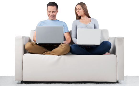 Portrait of cheerful Couple on the couch using laptops