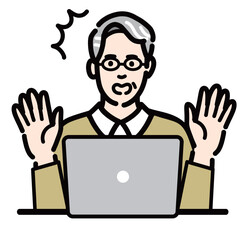 ラップトップの前に座って驚いているメガネをかけたシニア男性
