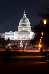 Fototapeta na wymiar Night Long Exposure Photo of Washington DC Capital Building During Christmas With Construction