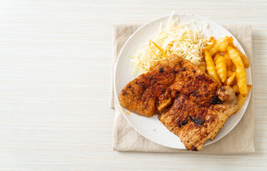 grilled spicy barbecue pork steak with french fries
