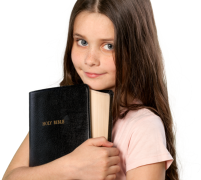 Cute little girl holding Bible on  background