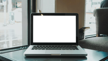 Blank screen laptop computer set up for work on white wooden desk, Mockup, Empty screen, Blank screen for product display.