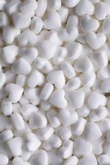 White heart sugar sprinkles close up texture