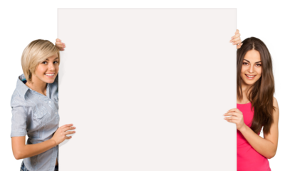 Two women with blank card isolated on white background