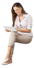 Portrait of a young  pretty woman sitting with tablet pc isolated on background