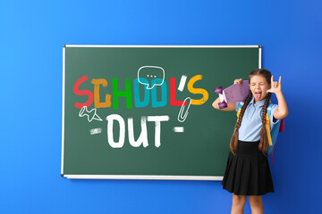 Little girl with skateboard near blackboard with text SCHOOL'S OUT on blue background